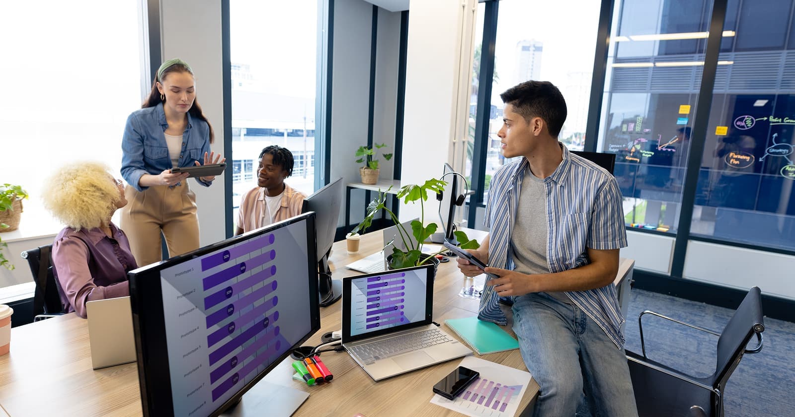 Vibrant Logics team reviewing product prototypes together