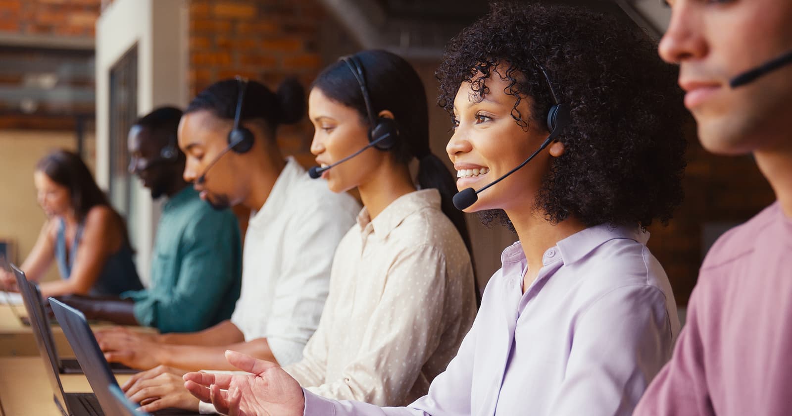 Vibrant Logics support team at their workstations
