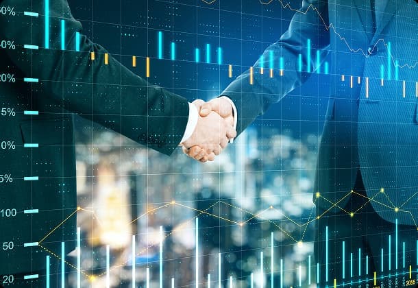 Business handshake overlaid with growth data, representing a Vibrant Logics client partnership