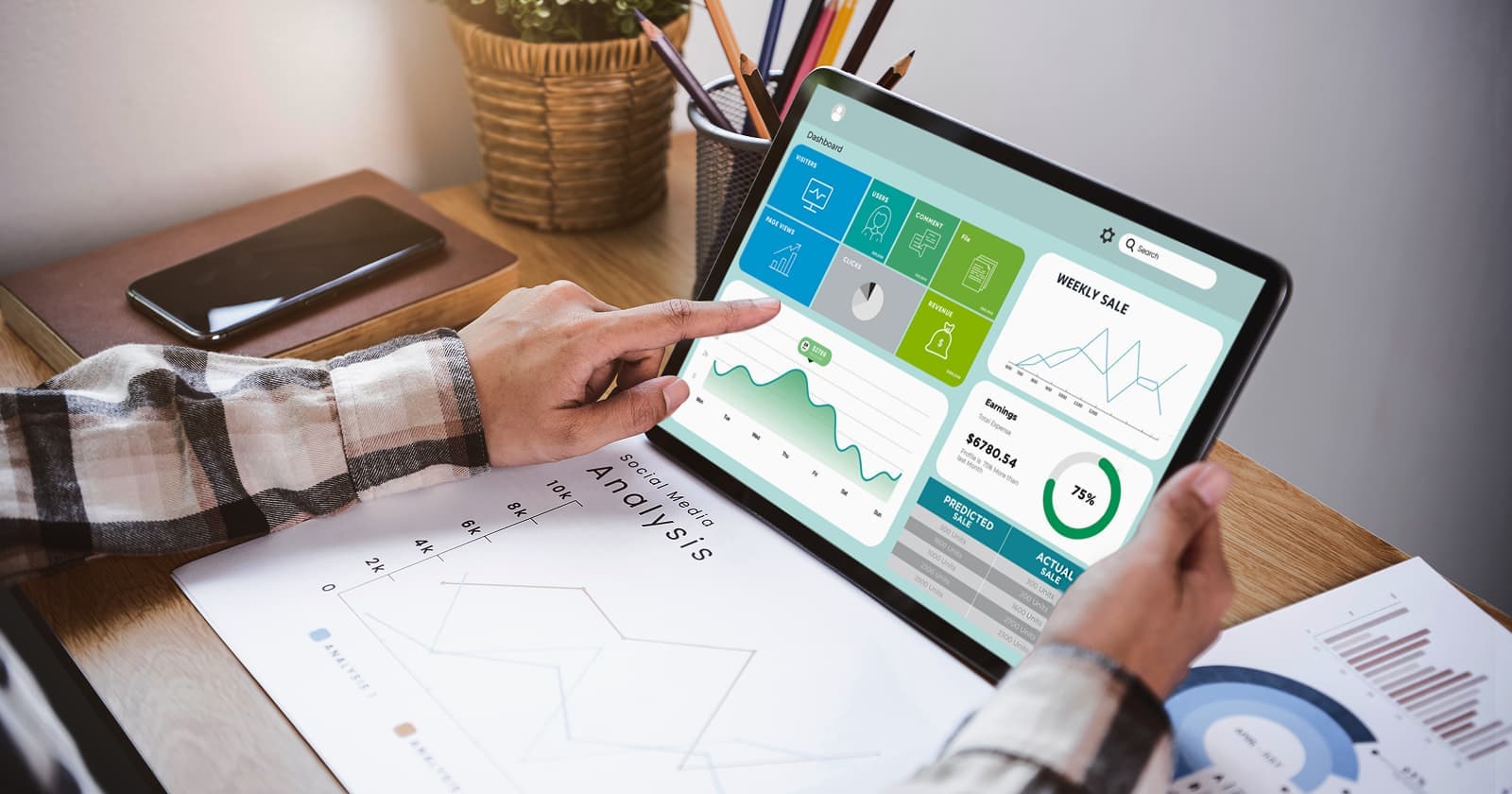 Analyzing business dashboard data on a tablet