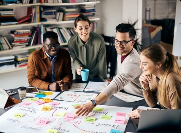 Vibrant Logics team brainstorming a project strategy together